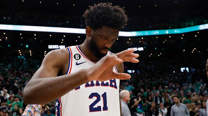 76ers guard James Harden drives toward the basket past Celtics guard Derrick White